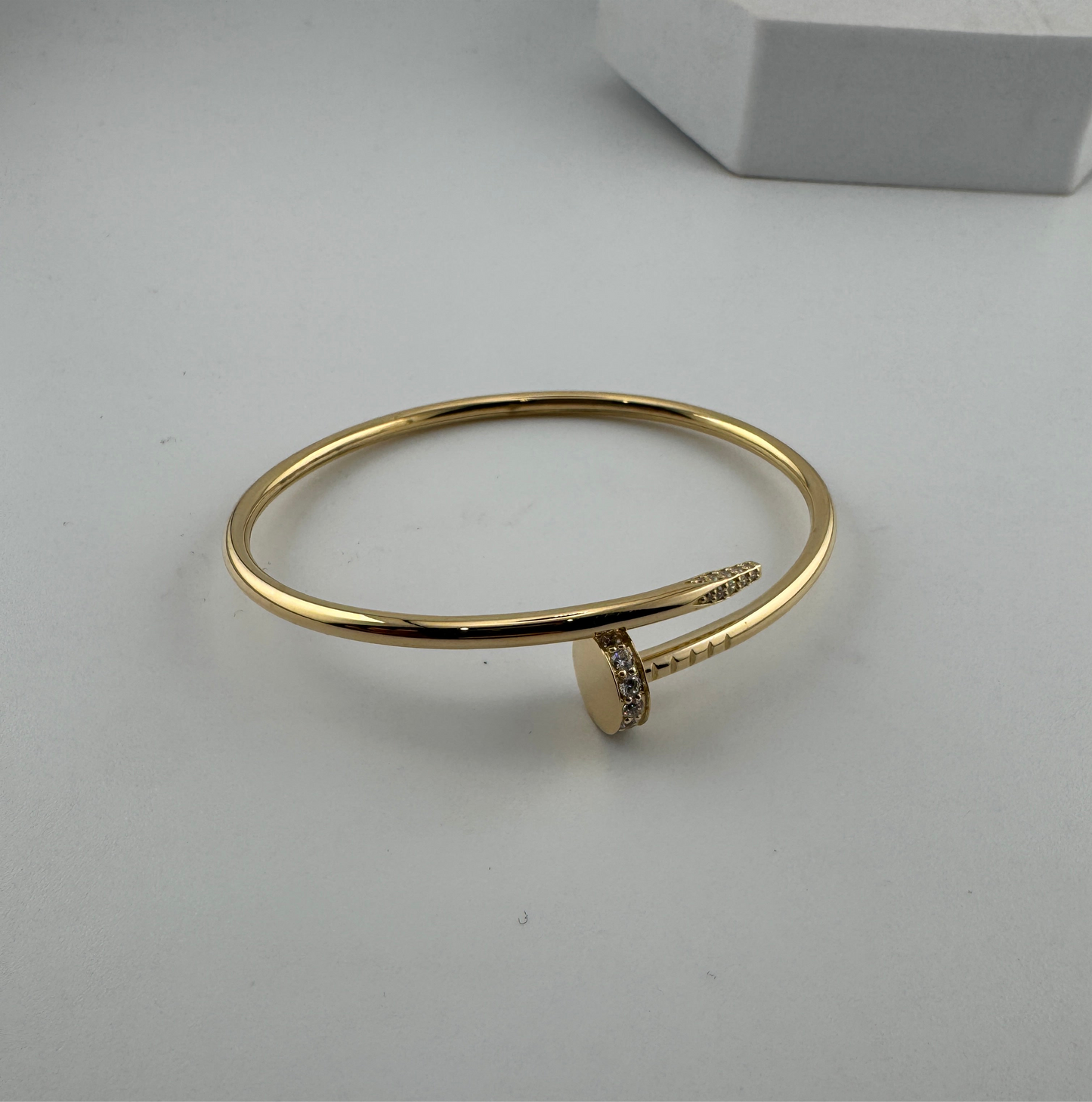 Solid 18k thin nail bracelet with premium zircon stones