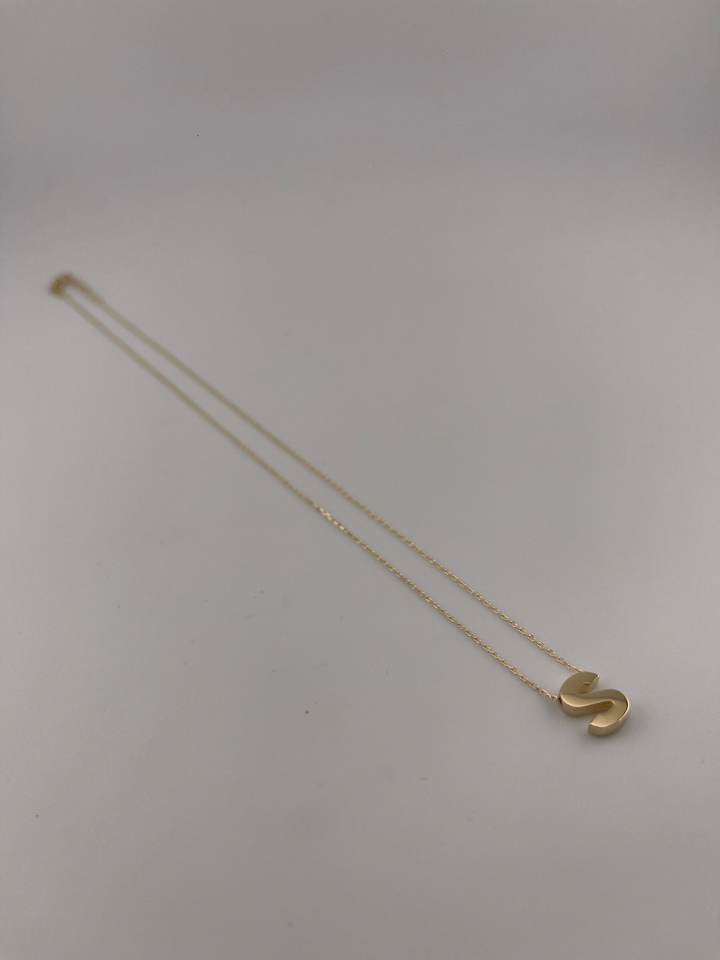 Initial letter necklace