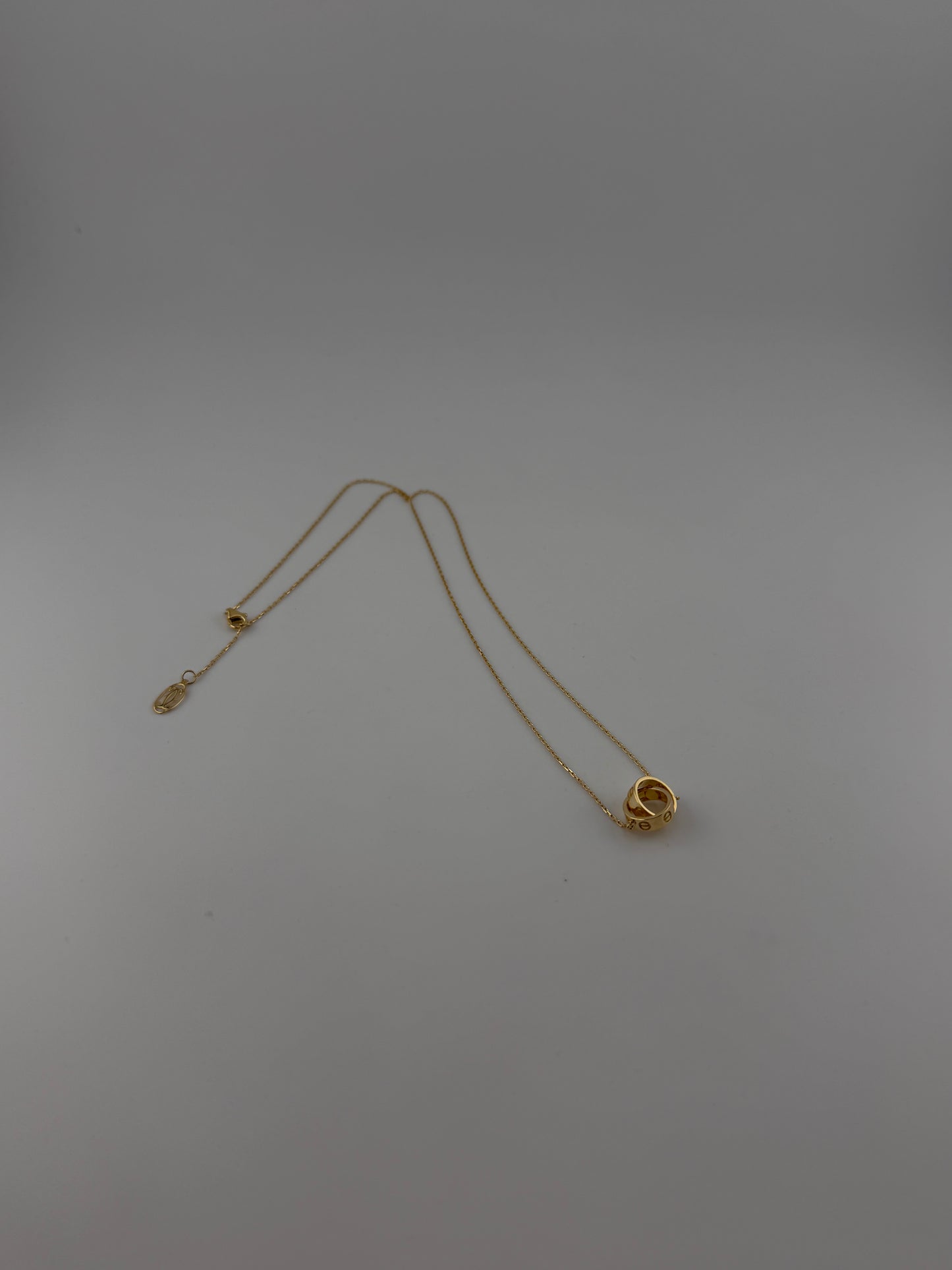 Solid 18k gold interlocking rings necklace