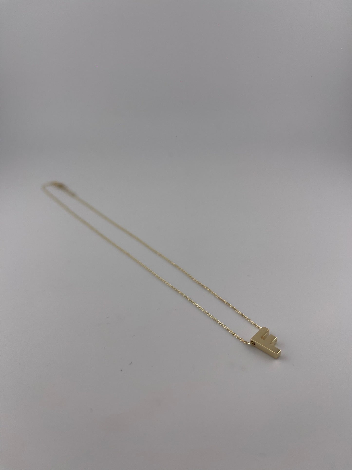 Initial letter necklace