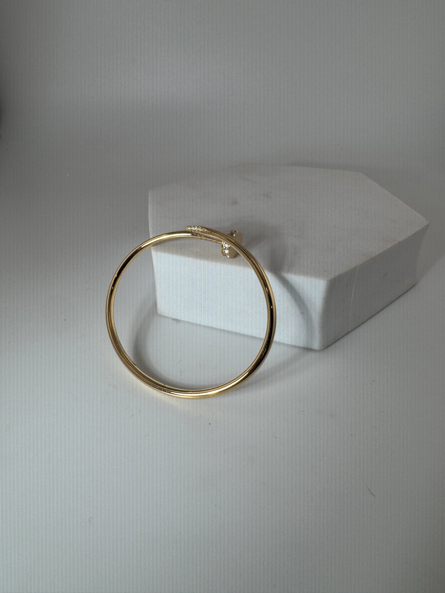Solid 18k thin nail bracelet with premium zircon stones