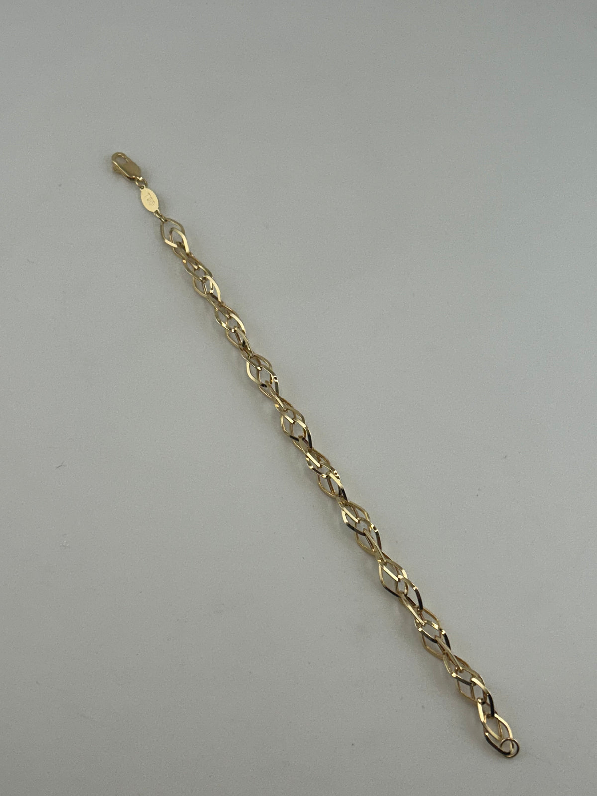 18K Solid Gold Interlocking Wave Link Statement Bracelet - Image 2