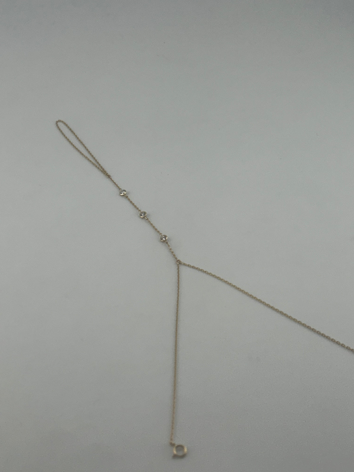18K Yellow Gold Hand Chain with Premium Cubic Zirconia - Image 1
