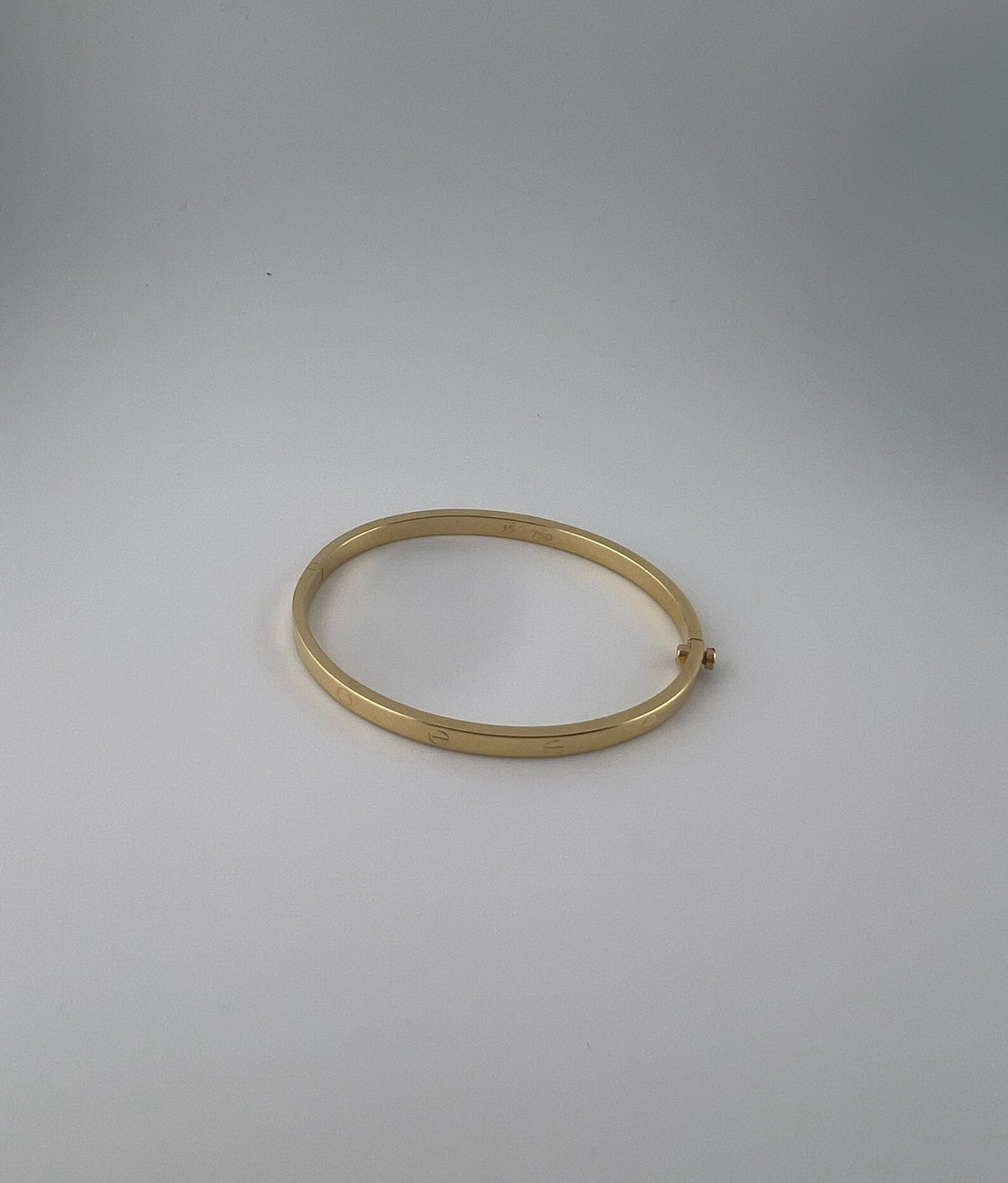 Thin hollow bangle, 18k gold, opens with a screw - Image 3