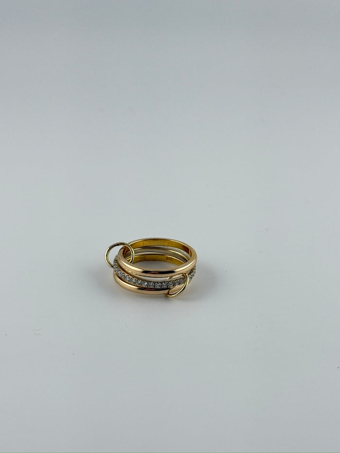 Tri-ring gold and diamond