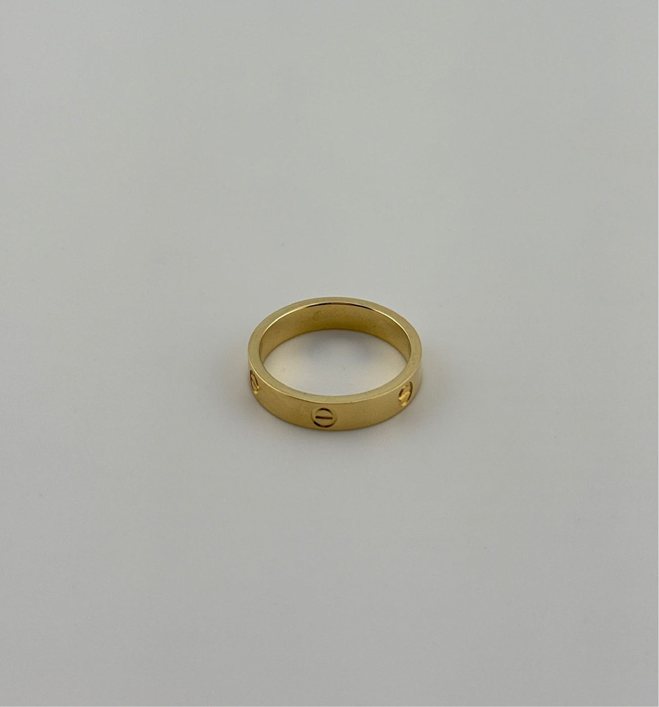 18k gold thin ring with screw markings, semi solid
