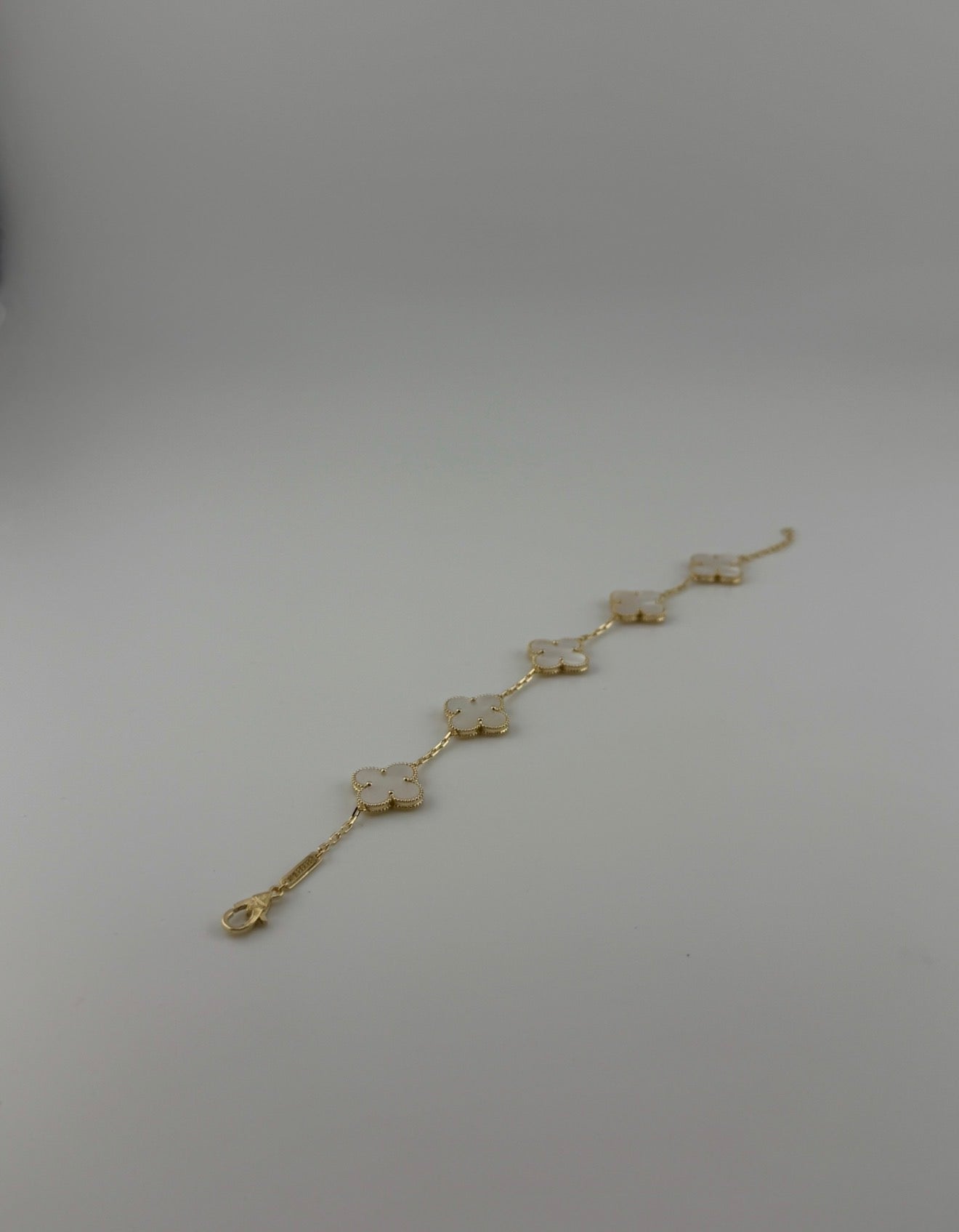 Solid 18k gold with premium white vinyl stone clover bracelet