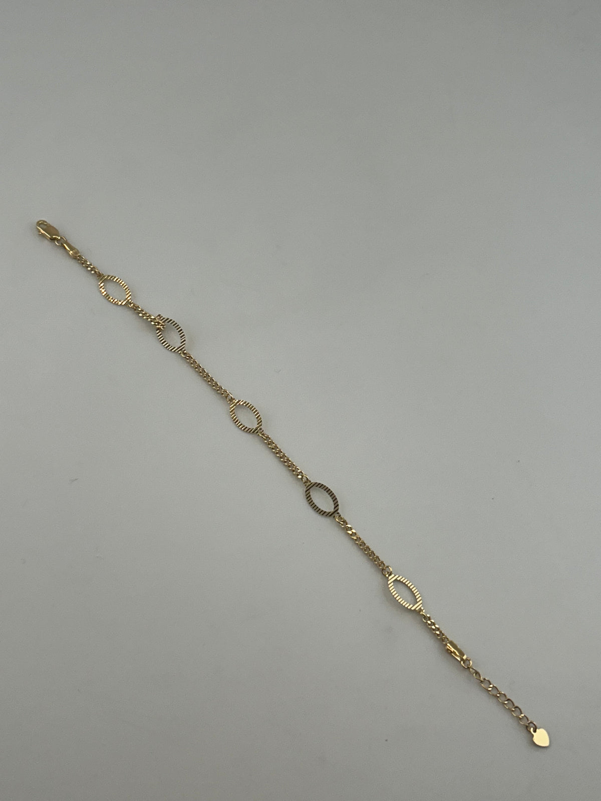 18K Solid Gold Diamond-Cut Oval Station Chain Bracelet - Image 1