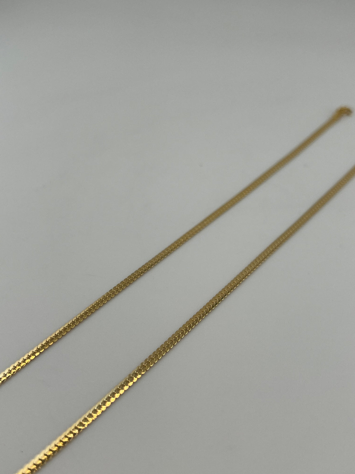 18K Solid Gold Tight Cuban Link Bracelet - Image 1