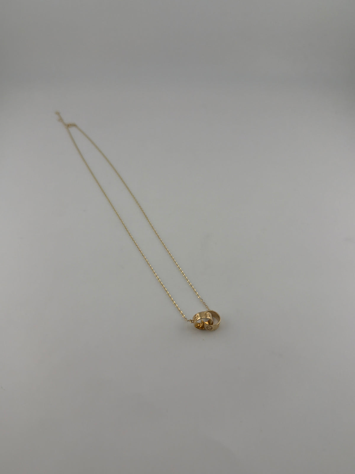 Solid 18k gold interlocking rings necklace - Image 2