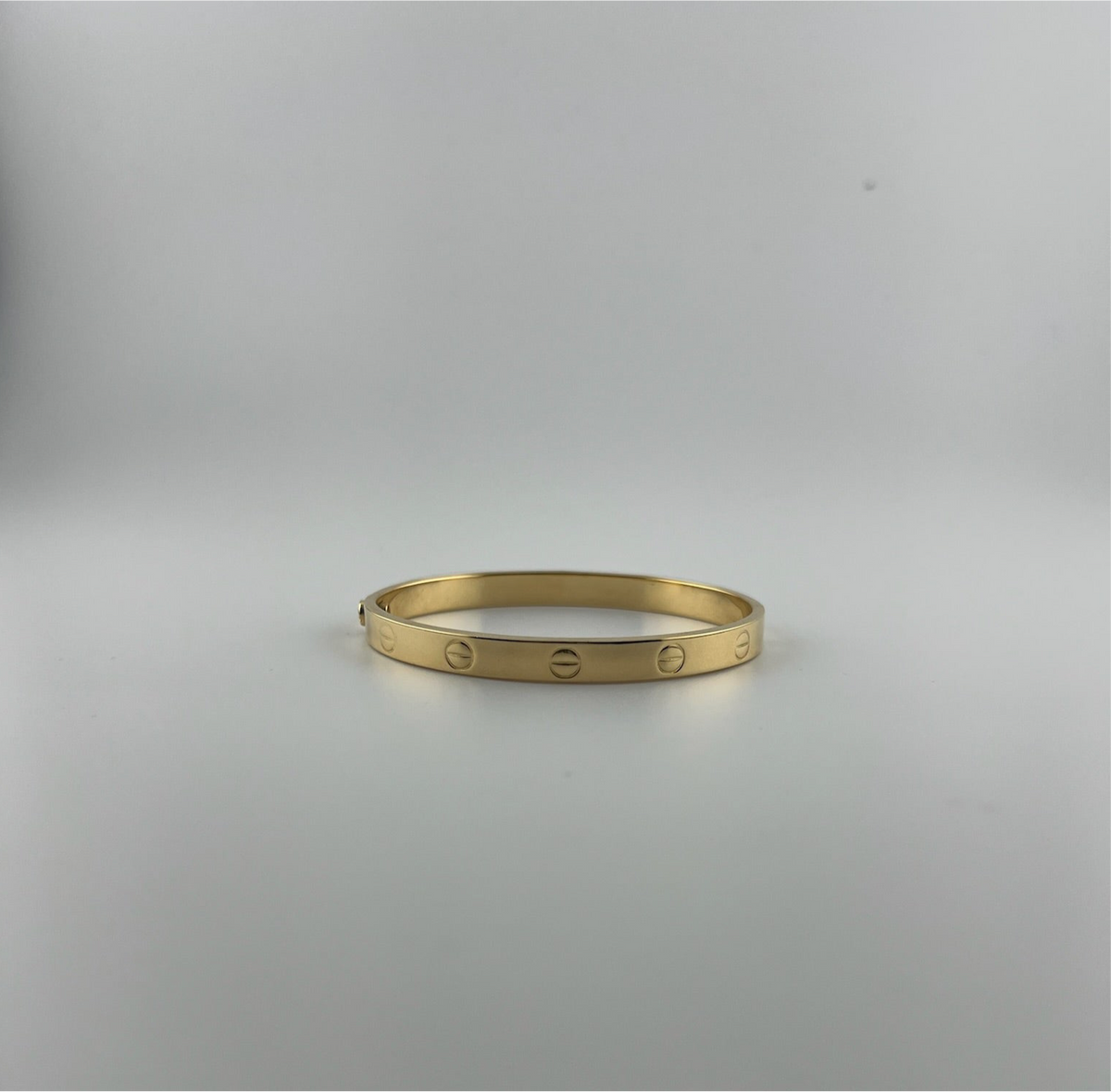 Bangle that opens with a screw, 18k gold, semisolid, regular width - Image 2