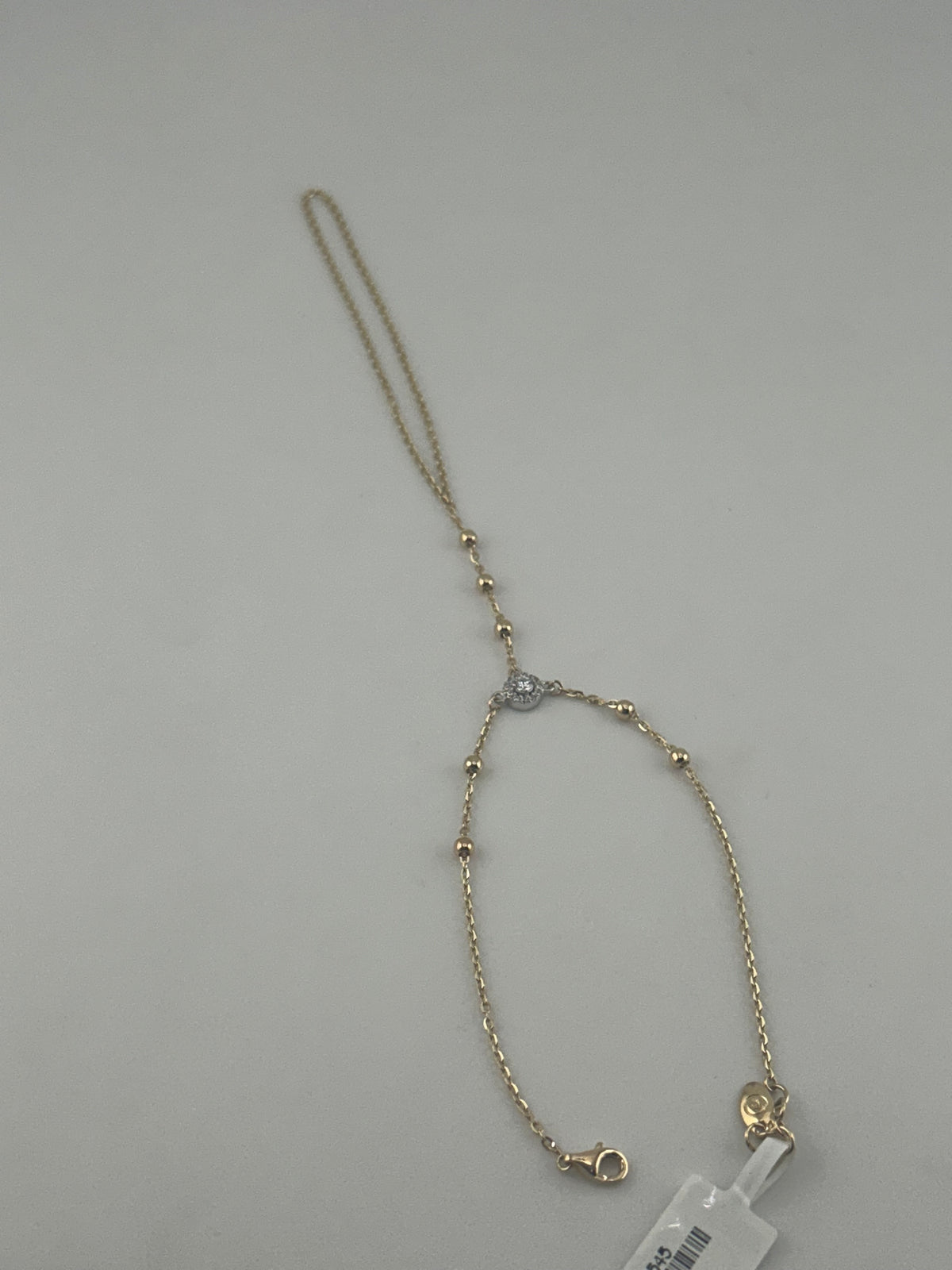 18K Yellow Gold Hand Chain with Premium Cubic Zirconia - Image 1