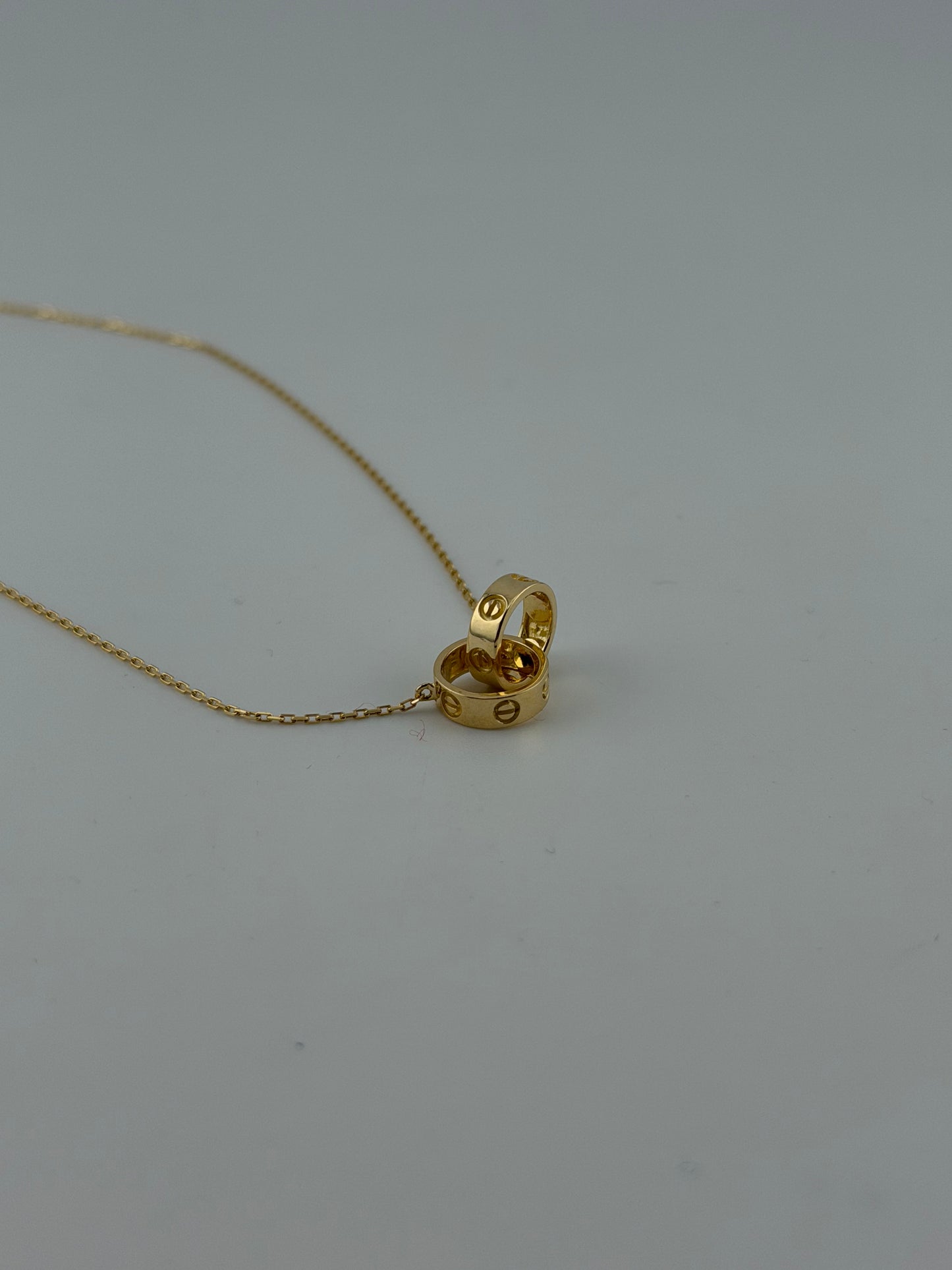 Solid 18k gold interlocking rings necklace