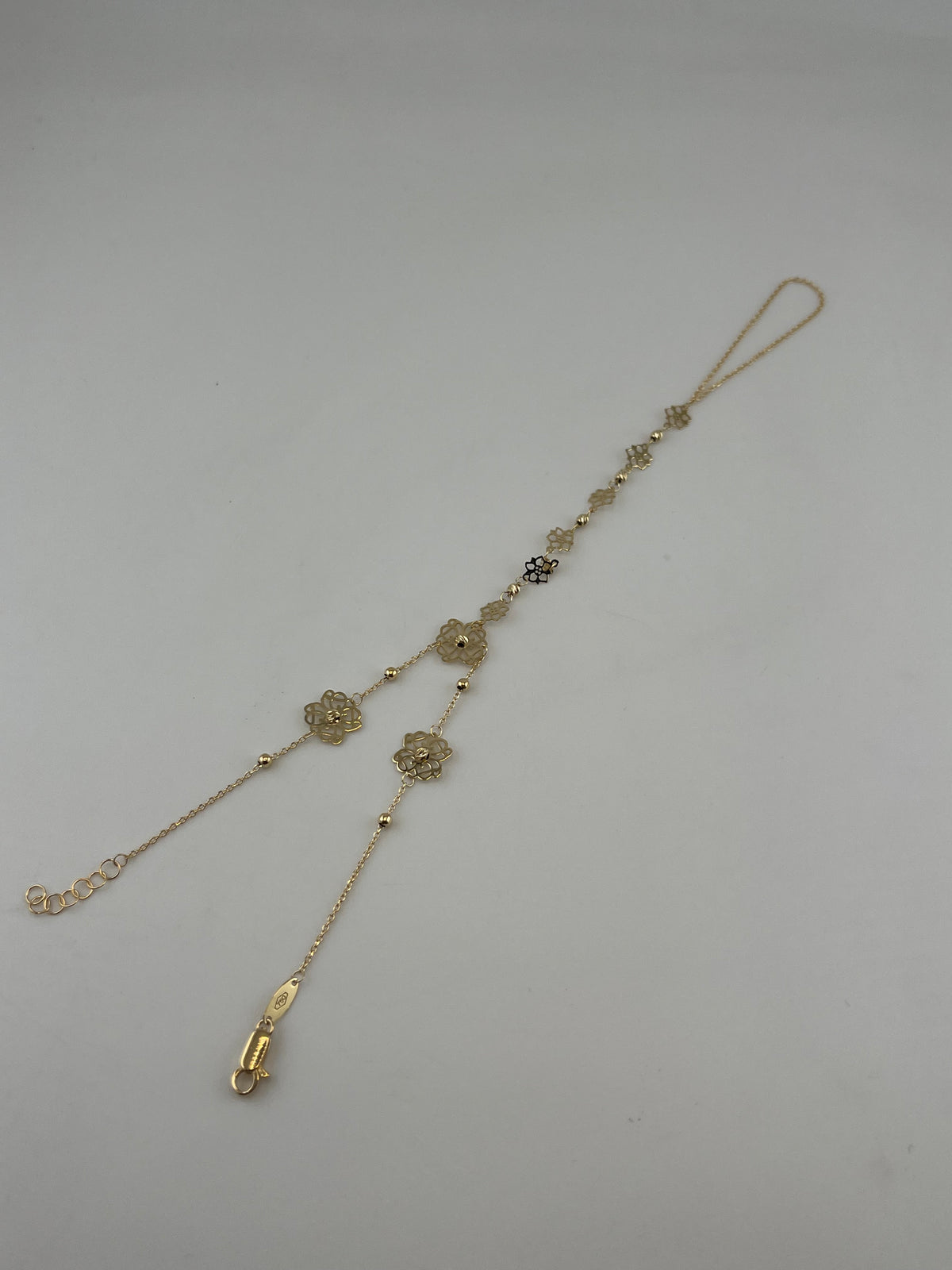 18K Solid Gold Floral Hand Chain Bracelet - Image 2