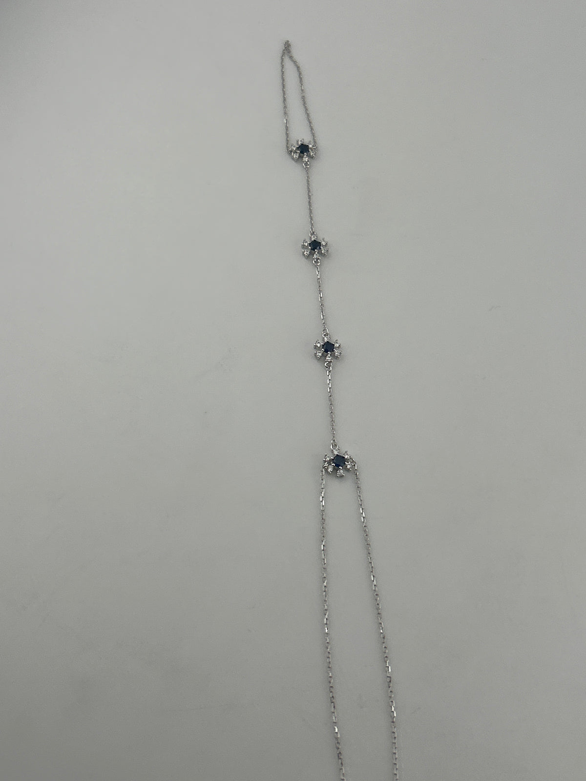 925 Sterling Silver Blue Stone Hand Chain - Image 1