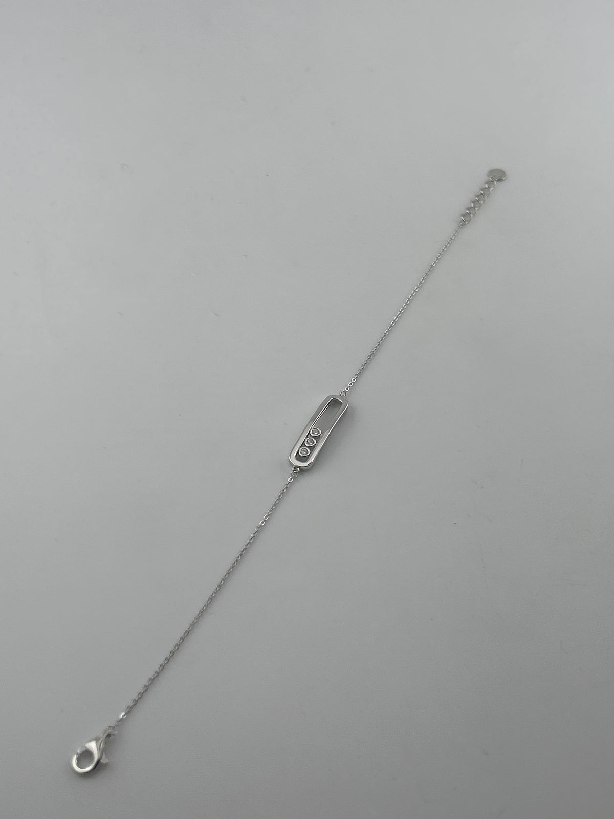 925 Sterling Silver Three Stone Movable CZ Bracelet - Image 1