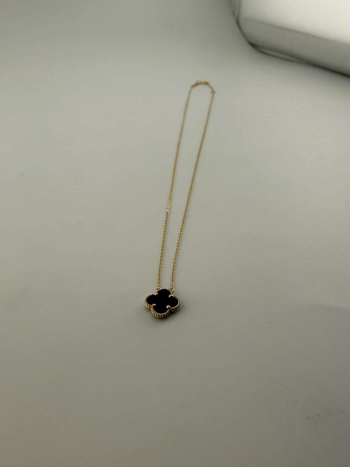 Small clover necklace solid 18k gold with premium vinyl stone (black) - Image 1