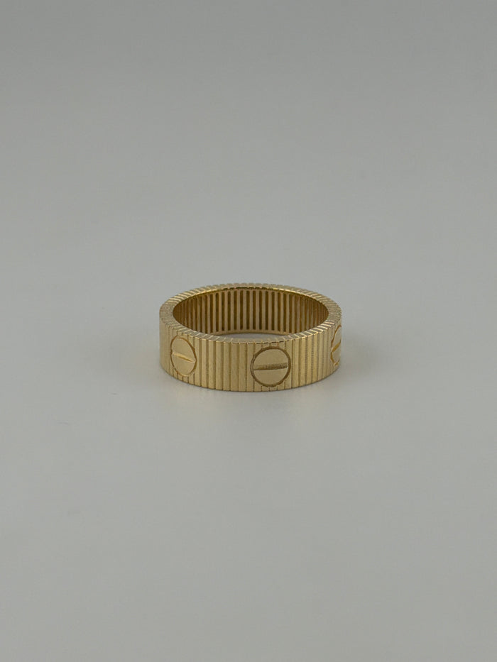 Lined ring with screw markings
