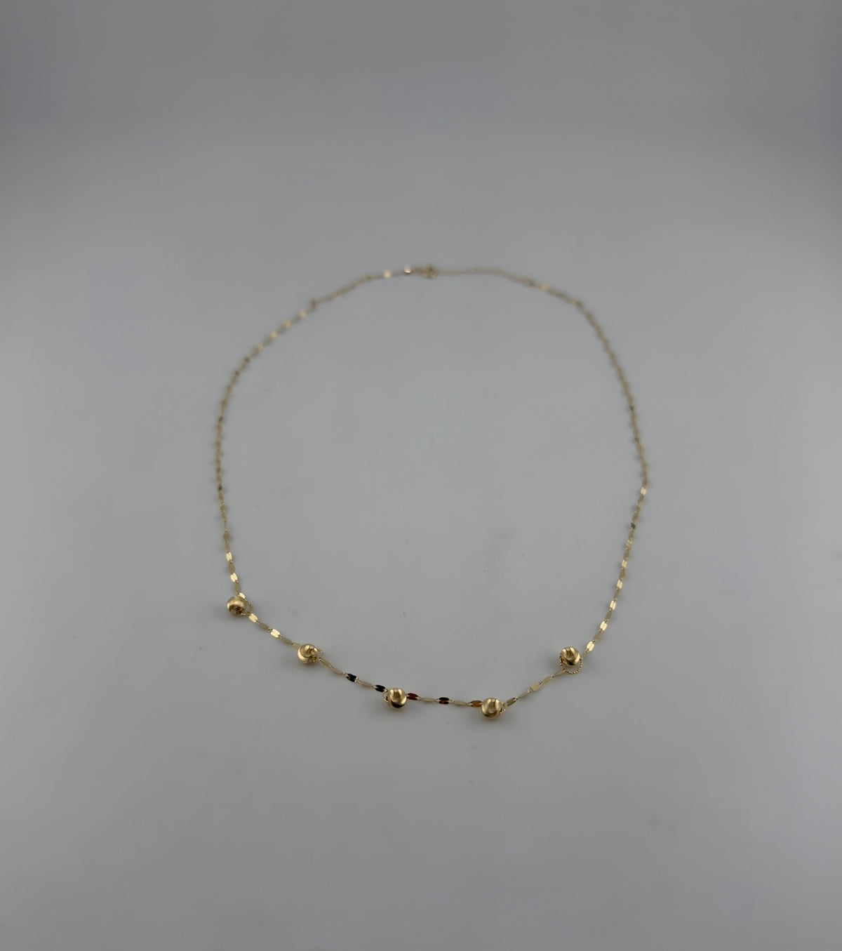 5 gold balls necklace with fine sequin chain - Image 1