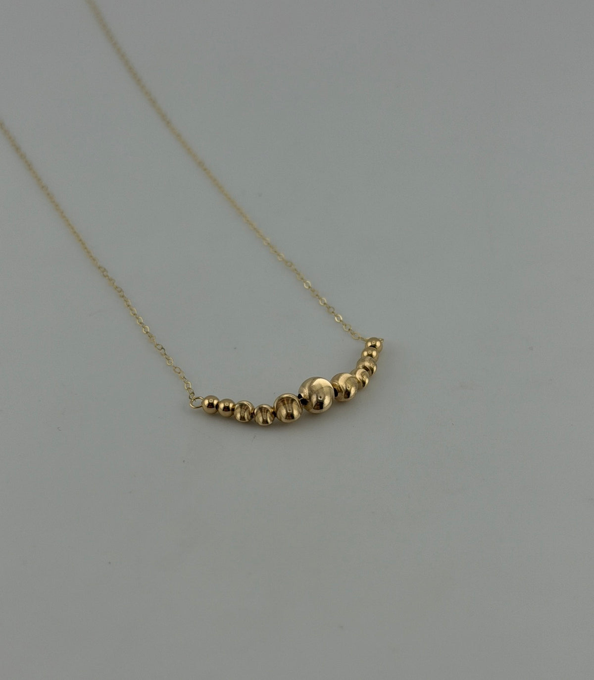 18K Gold Graduated Ball Cluster Necklace - Image 1