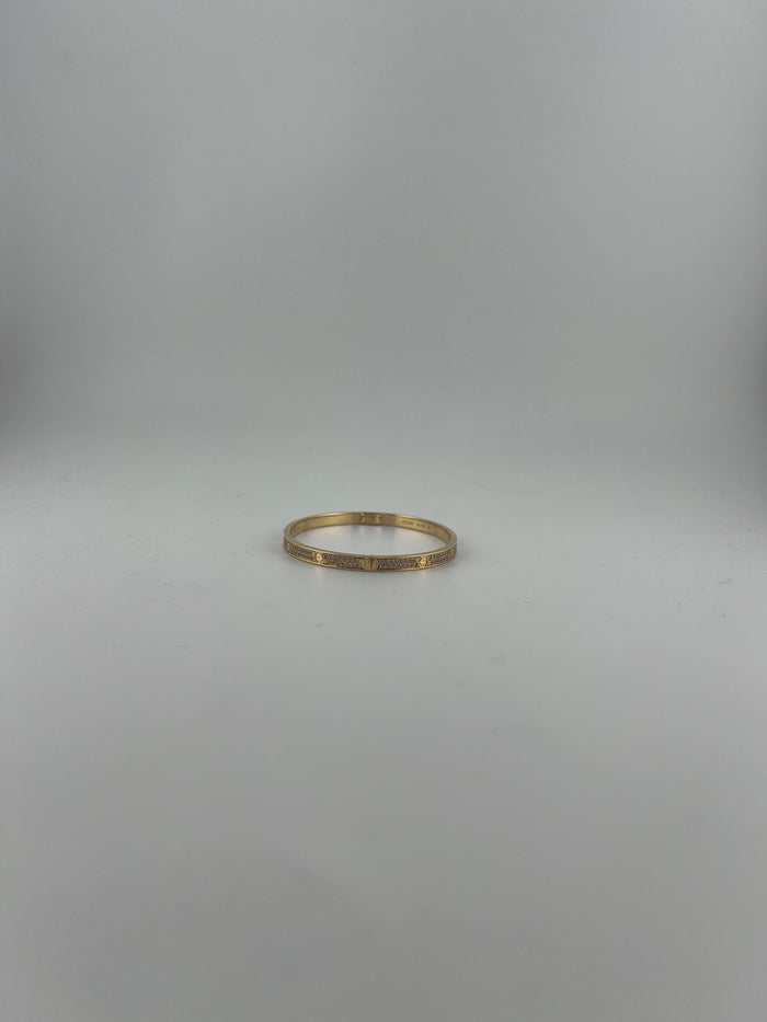 Yellow gold Full-Pave bangle with screws markings