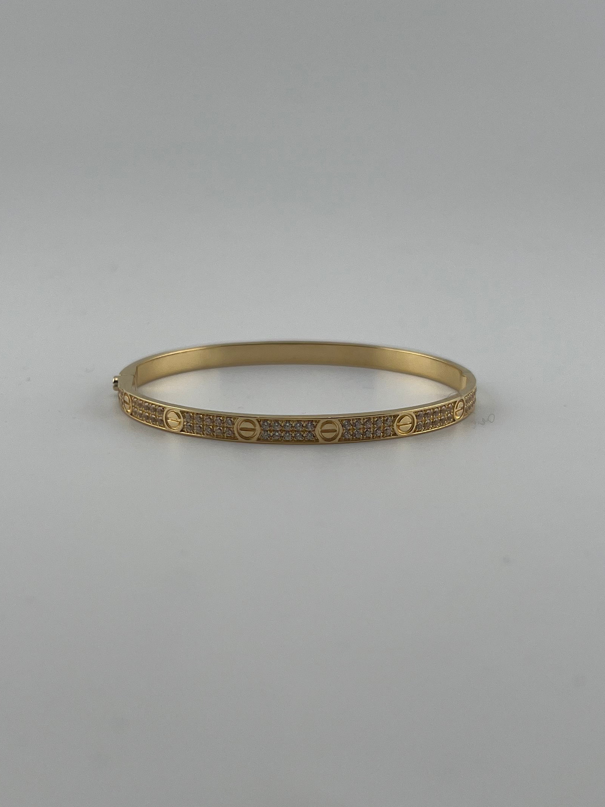 Yellow gold Full-pave 18K gold bangle with screw markings - Image 1