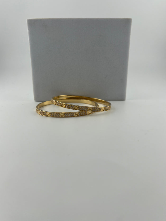 Yellow gold Full-pave 18K gold bangle with screw markings