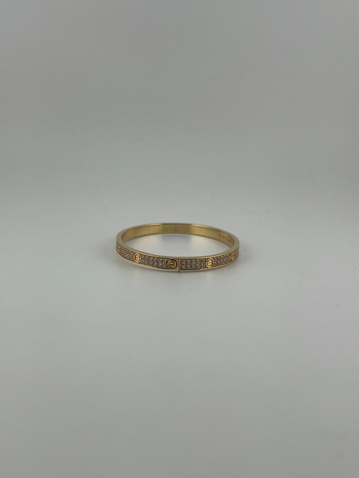 Yellow gold 18K Full-pave bangle with screw markings