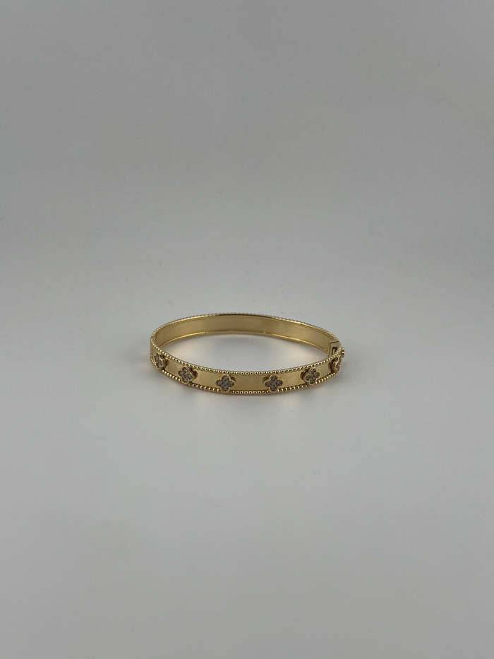Semi-solid 18k yellow gold clover bangle with CZ stones