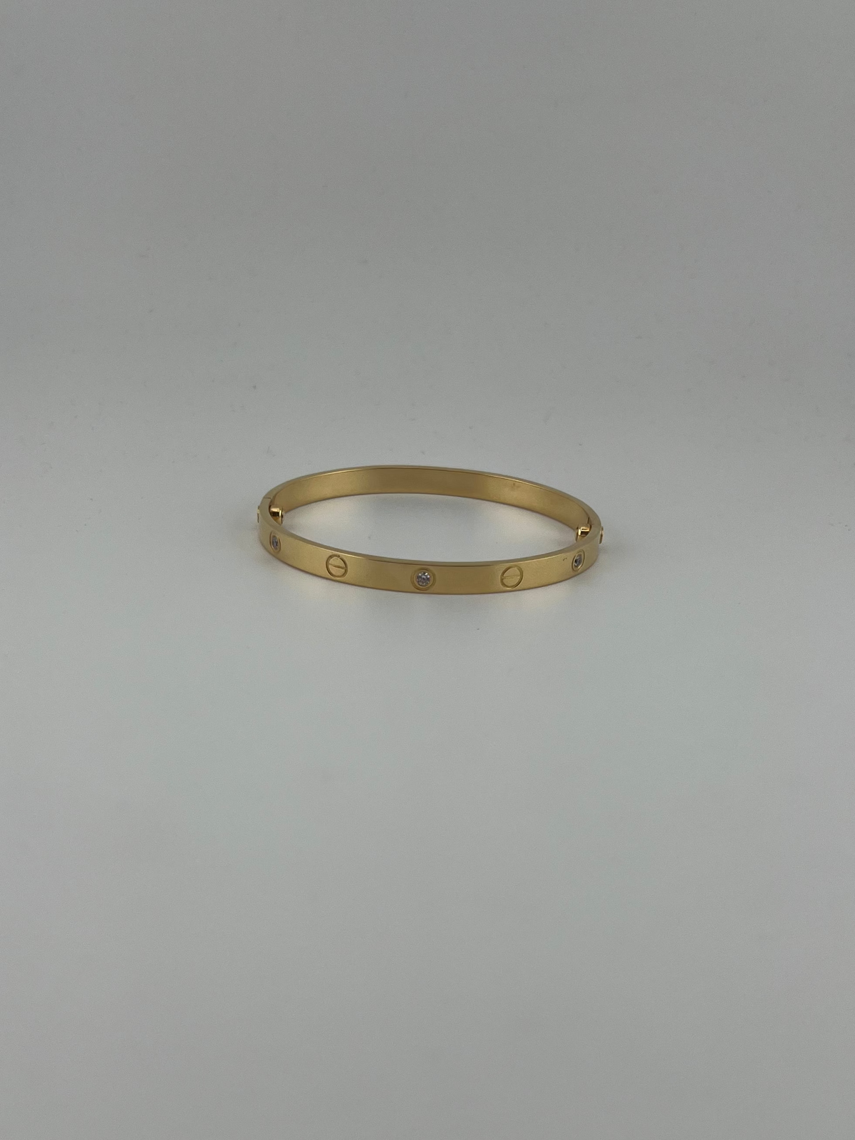 Two screws 18k yellow gold CZ six-stone bangle with screw markings - Image 3