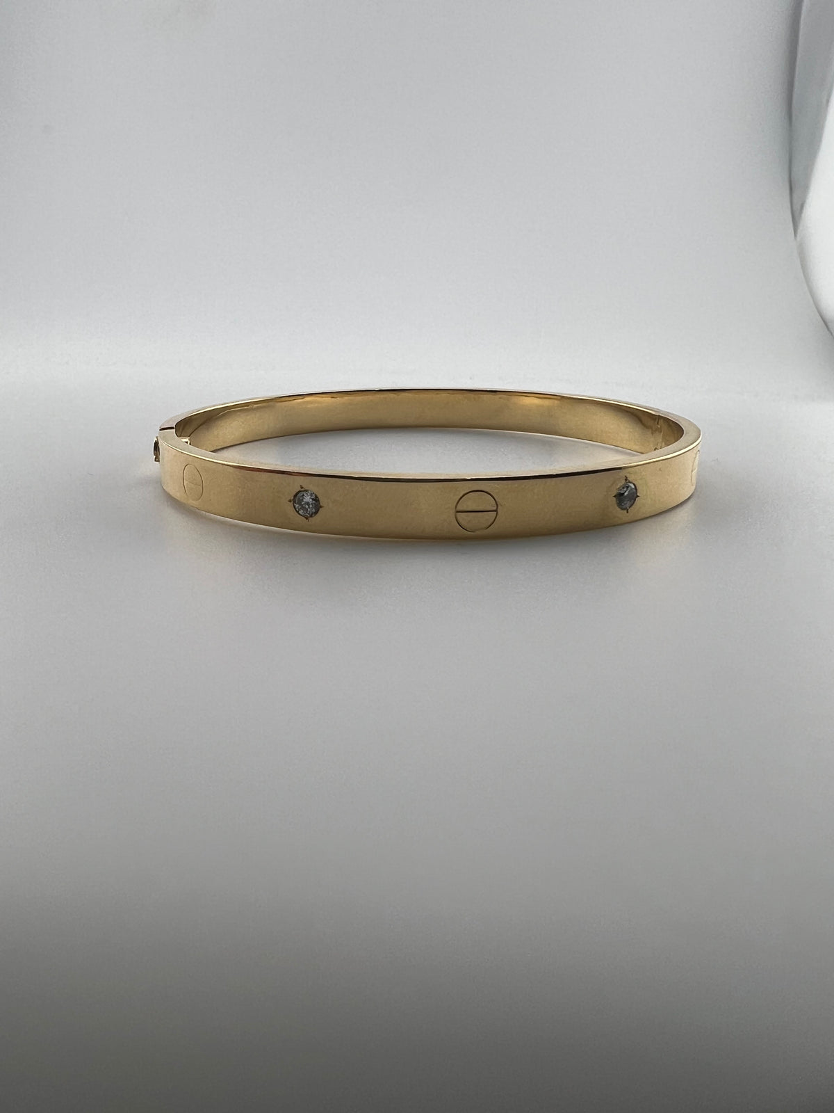 Four-Stone CZ bangle with screw markings 18K yellow gold - Image 2
