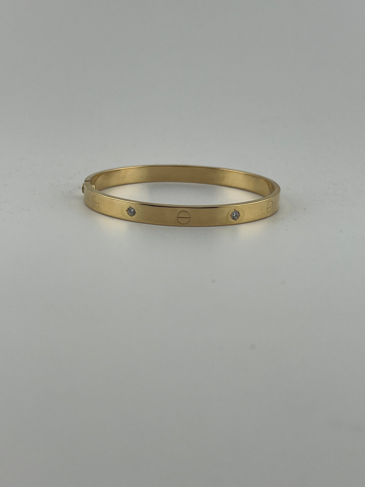 Four-Stone CZ bangle with screw markings 18K yellow gold - Image 1