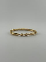 Solid 18k yellow gold bangle with spikes - Image 1