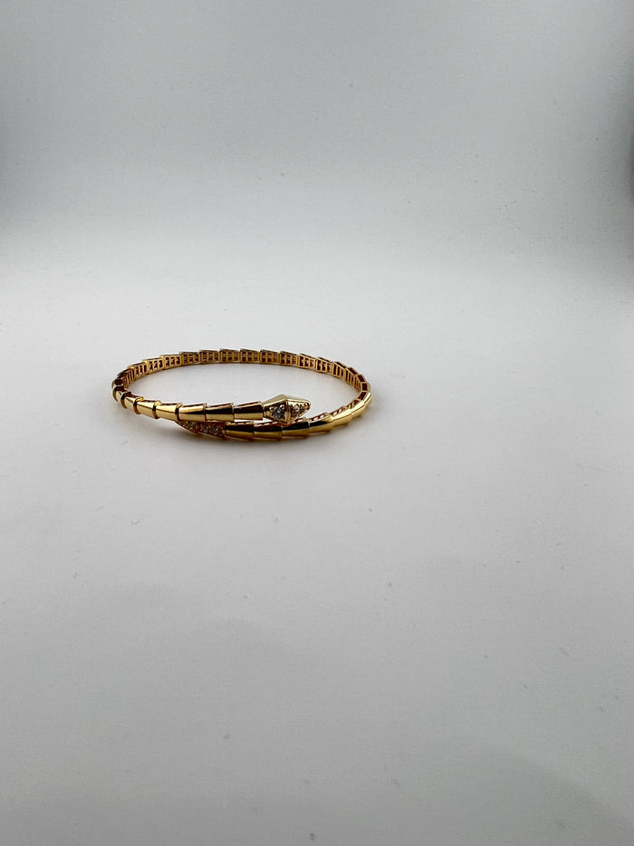 Snake twist bangle with premium CZ stones on the tip