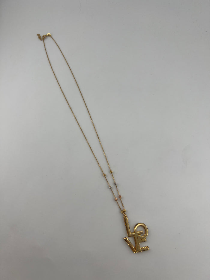 The Signature "Love" Pendant in 18k Yellow Gold